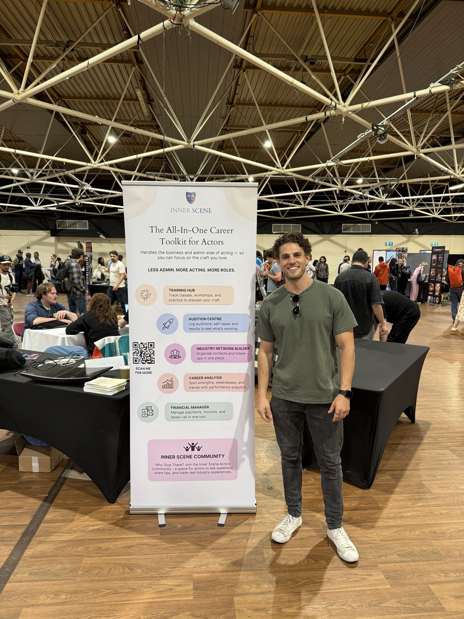 Tristan Alexander with Inner Scene banner at a convention, promoting the career toolkit for actors