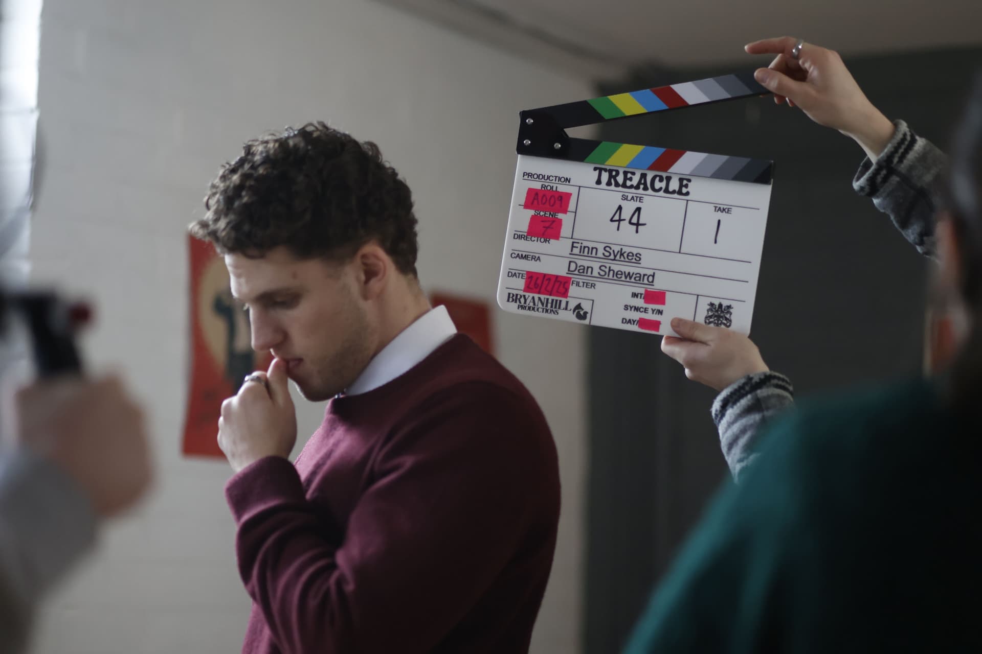 Tristan Alexander on set of Treacle - behind the scenes with clapperboard